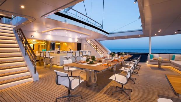 The main deck aft has a bar with seating for 12 and a retractable roof.