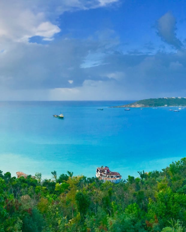 Aside from the tattered cargo ship washed ashore at Anguilla’s Road Bay, from this view, you would never know that a Category 5 hurricane ravaged the island only a few months ago. Charter yacht Dream is at anchor in the background at far left.