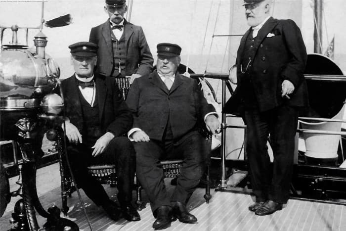 Cleveland (seated, center), aboard Oneida.