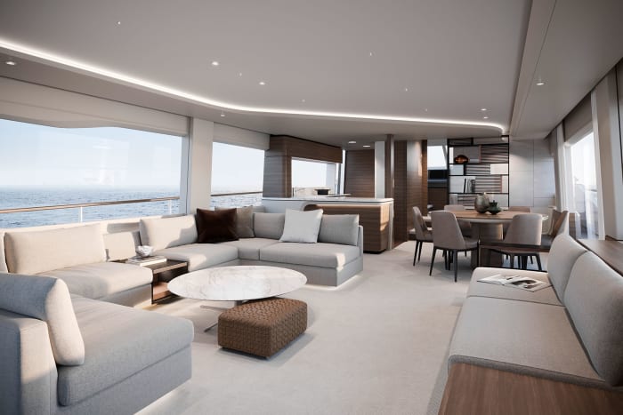The Y85’s main deck feels more casual than on previous models, with a round dining table rather than a rectangular one, and with an open galley and bar facing the salon. 