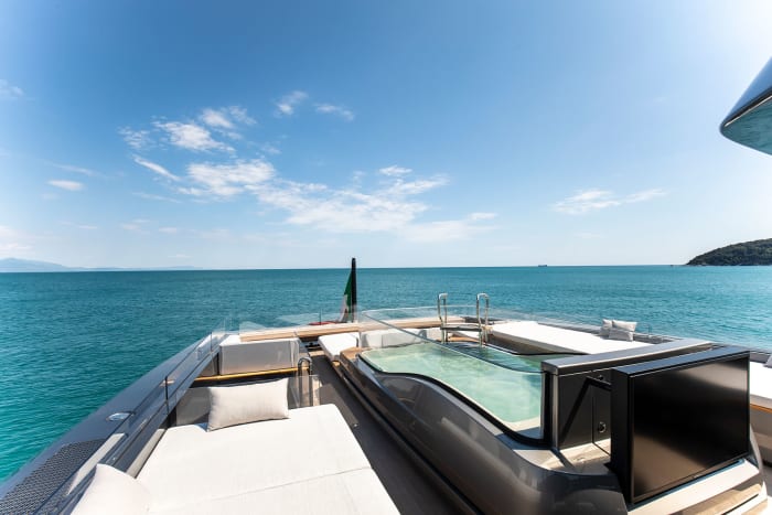 The glass-walled spa tub on the open sundeck. 