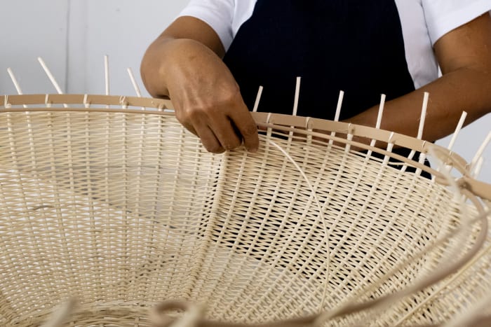 Artisans practice age-old weaving. 