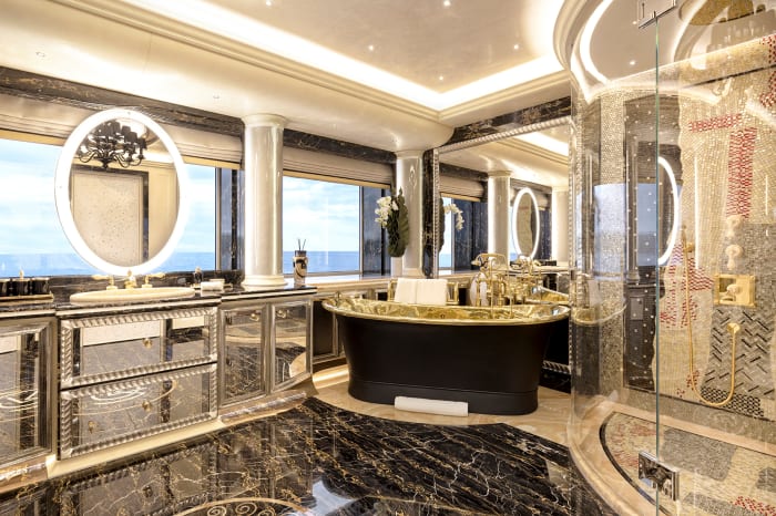 A gilded bathtub in the owner’s bathroom. 