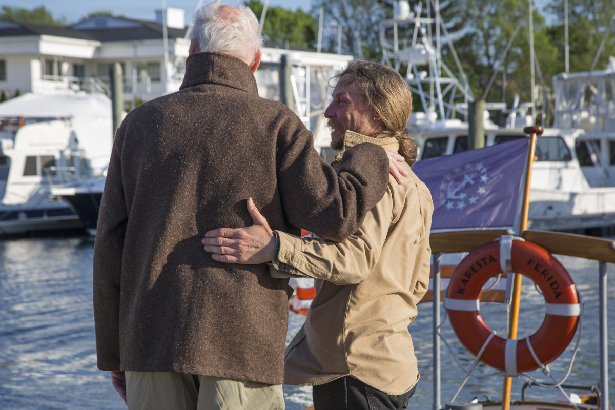 Lee and Dominic Zachorne, longtime friends and boat partners, discuss the posterity of the fleet while walking the docks at Wickford Shipyard.
