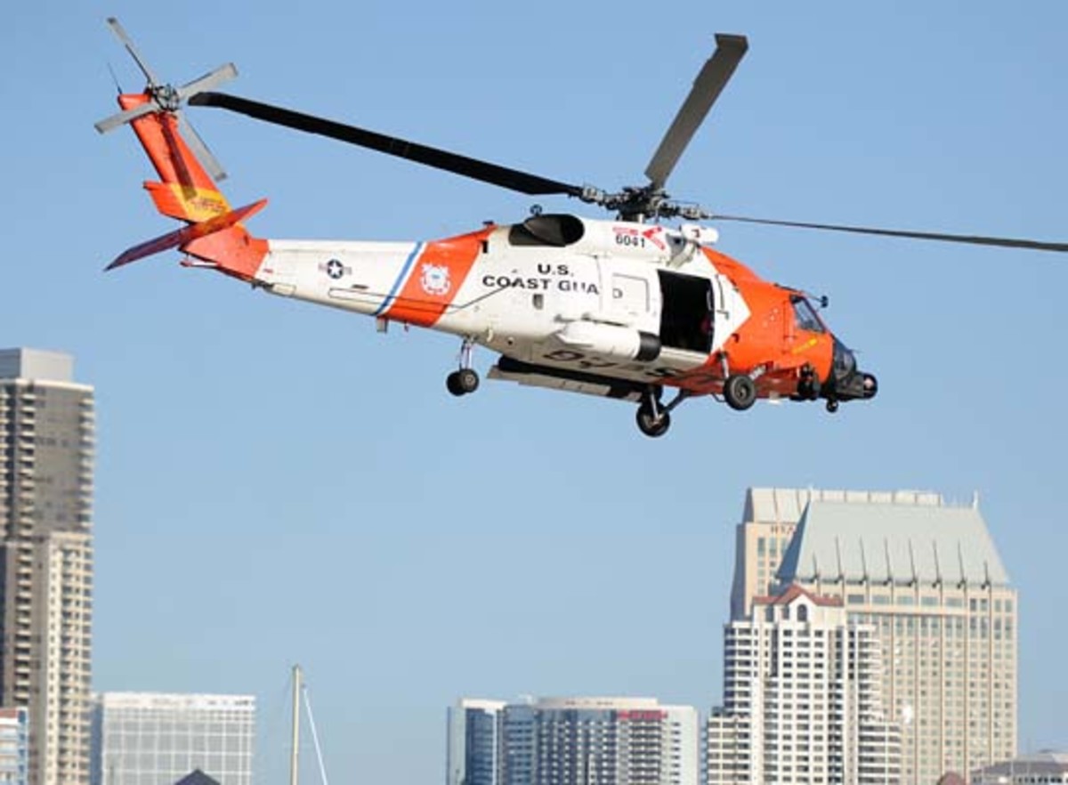 A Coast Guard MH60 Jayhawk helicopter hovers at Air Station San Diego.
