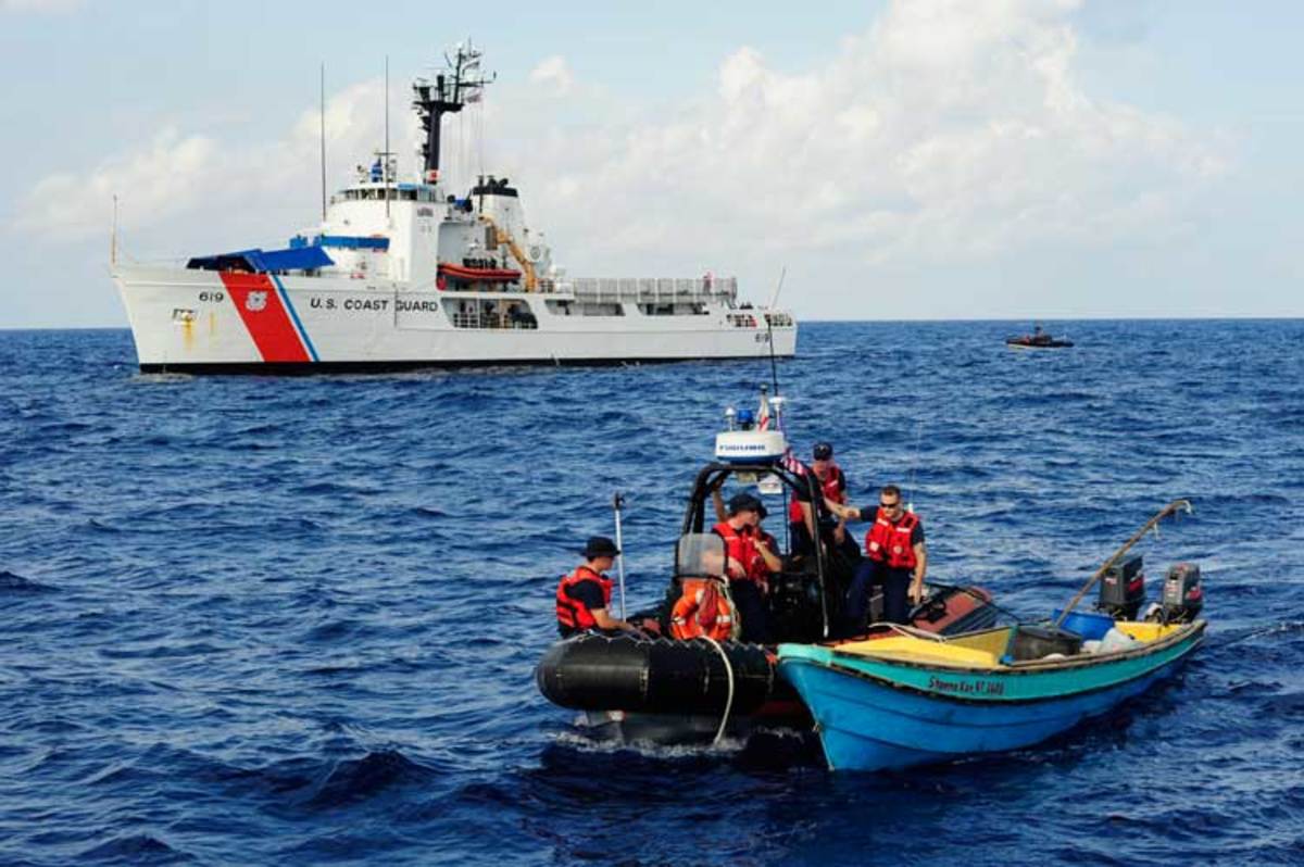 Crewmembers of Coast Guard Cutter Tampa tow an intercepted vessel off the east coast of Florida, where 1,100 pounds of marijuana were seized and six suspected smugglers were detained. In fiscal year 2014, the Seventh District seized an estimated wholesale value of $936 million in cocaine and marijuana, according to Capt. Mark Fedor, chief of response for the U.S. Coast Guard’s Seventh District.
