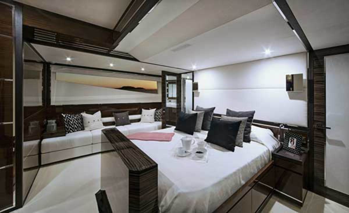 The lavish, full-beam master stateroom has a king-size bed, a huge walk-in closet and an en suite head with his-and-hers sinks—an inviting retreat for owners any time of day.