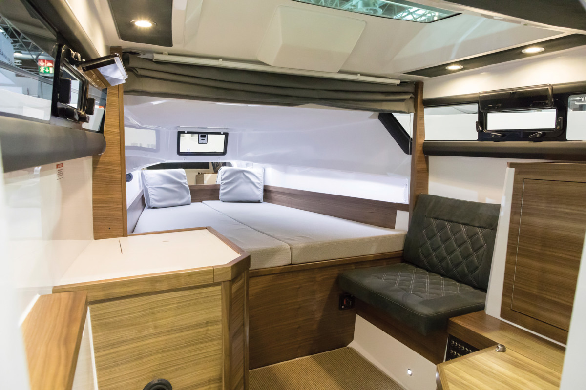 The 37’s cabin provides basic amenities such as a comfortable berth with privacy curtain, a head and a minimal galley.
