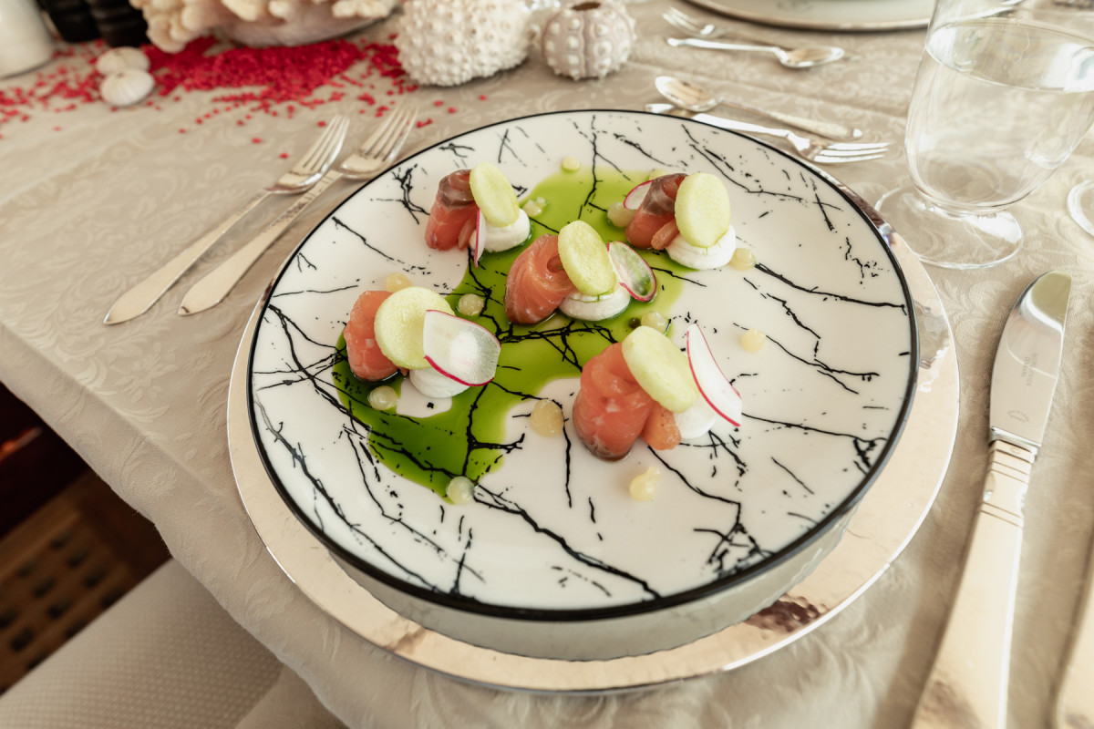 Smoked salmon with cucumber and shaved radishes is a refreshingly light starter for a summery charter lunch.