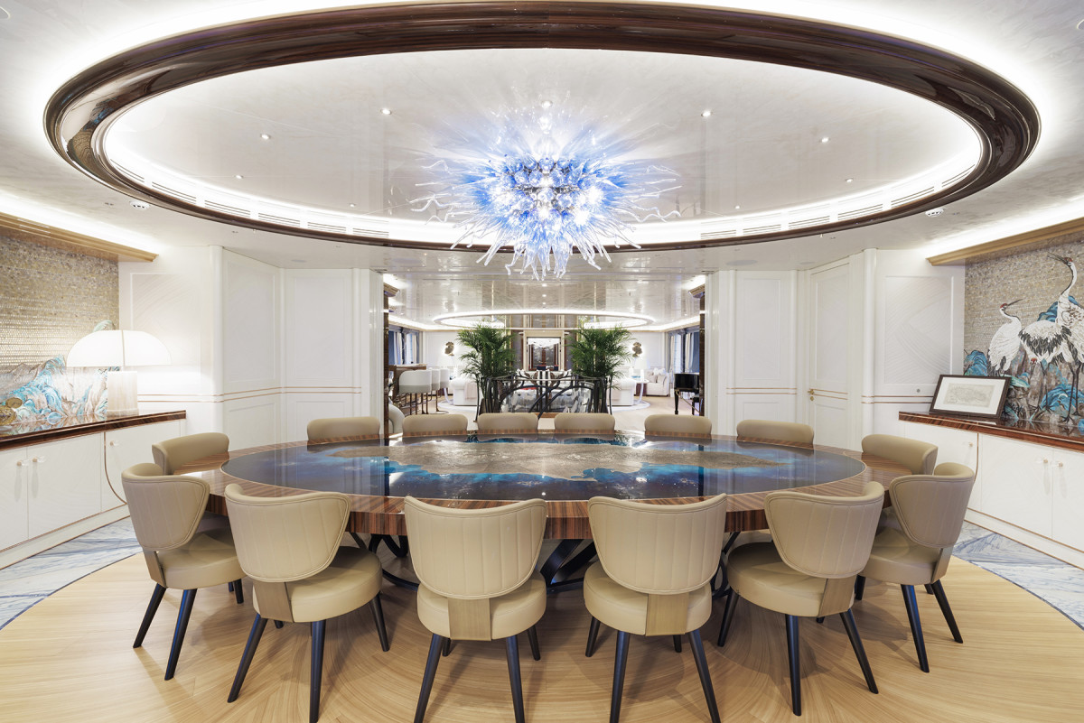 The boardroom on the main deck has a custom conference table with an antique map of Jamaica engraved in bronze and embedded in deep blue resin.   