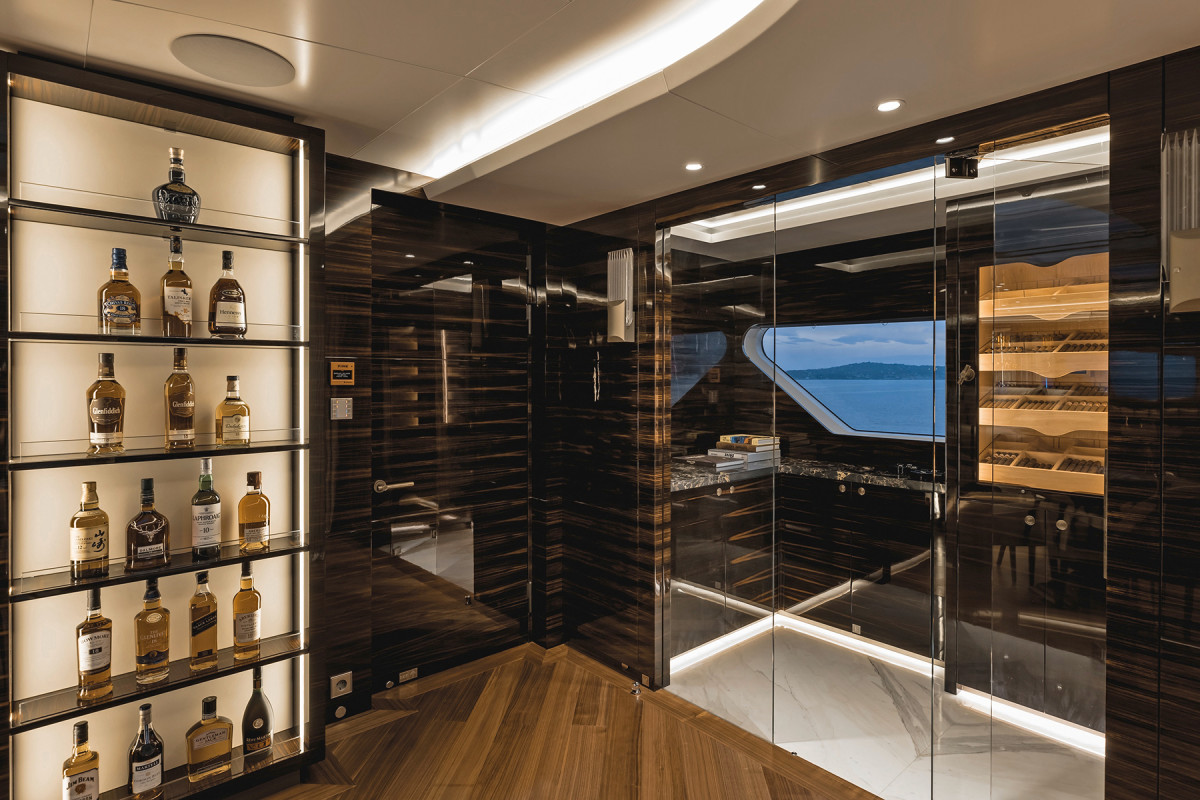 The bar and cigar humidor in the ‘man cave’ on the top deck. 